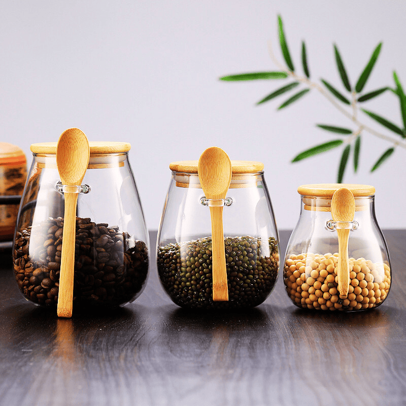 Bocal en verre borosilicate hermétique avec couvercle en bambou pour conservation d’aliments et épices.