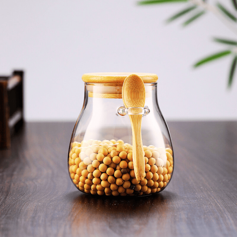 Bocal alimentaire en verre hermétique avec couvercle bambou, parfait pour épicerie et rangement maison.